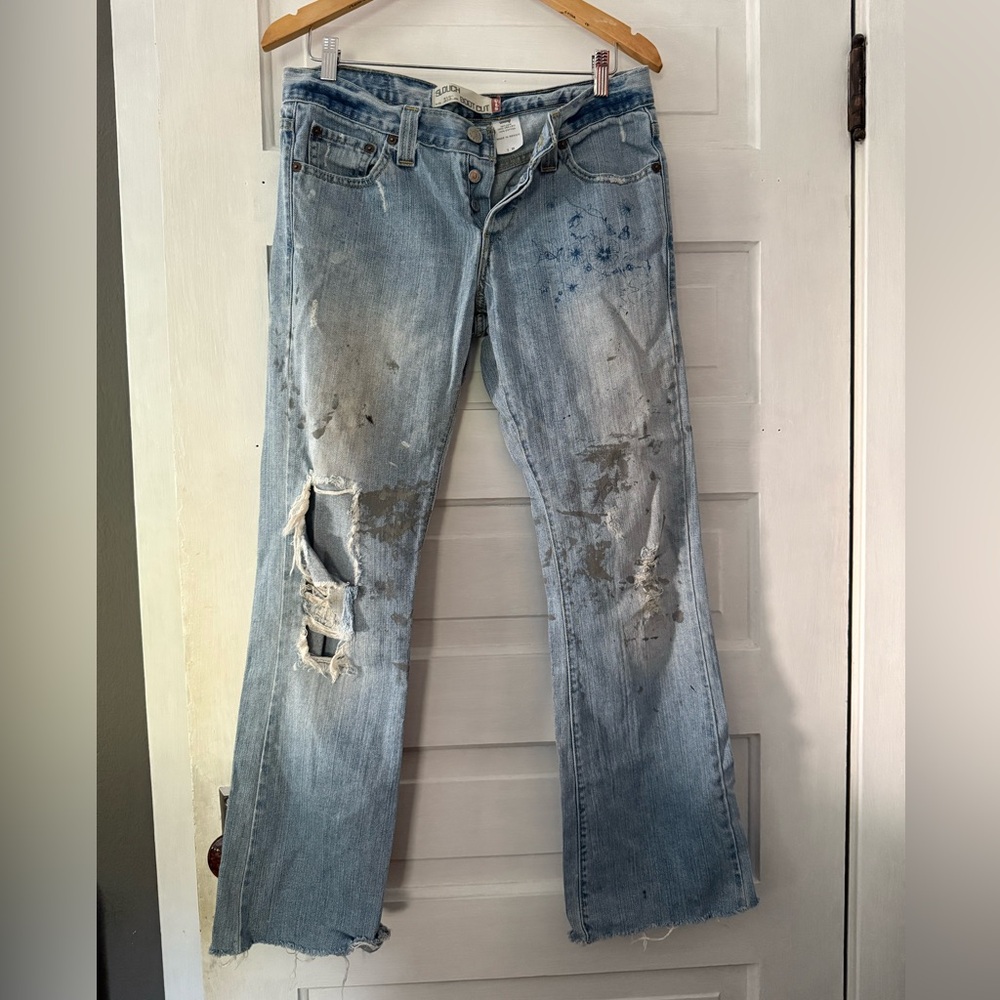 Levi's Light Blue 513 slouch Distressed Boot Cut Jeans Button fly